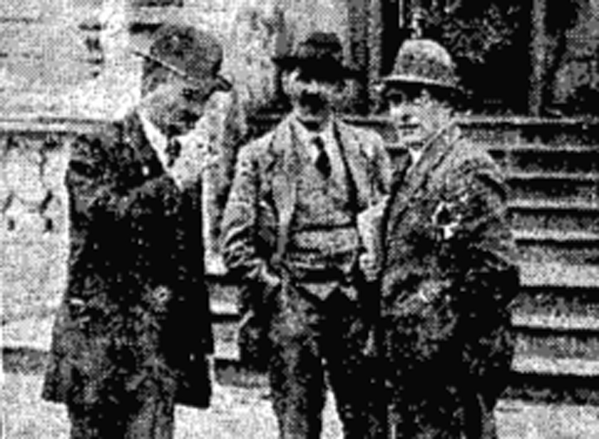 Thomas Johnson, Secretary, Irish Labour Party and Trades Union Congress (left) chatting with two of the of the delegates at the Labour Congress in Dublin. 