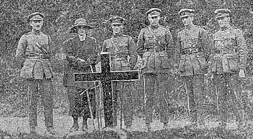National army officers erect cross in honour of Michael Collins at ambush site