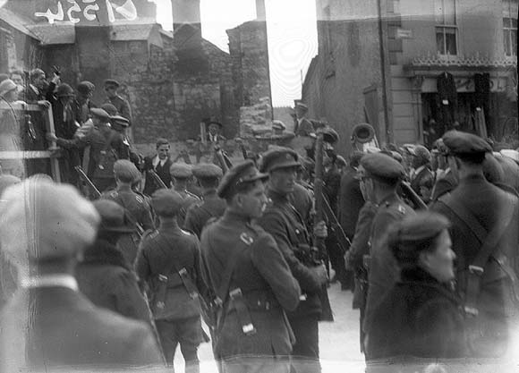 Photograph of “They are coming for me, boys” - de Valera dramatically arrested at Ennis election rally