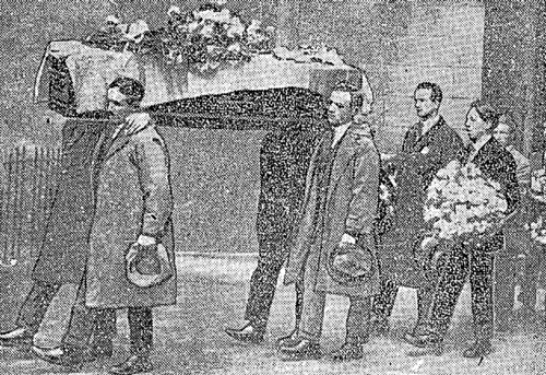 The coffin, covered with the tricolour and bearing the remains of Noel Lemass being removed from St. Kevin's Chapel Pro-Cathedral yesterday  