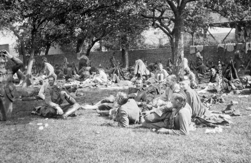 Men of the 1st Cameronians halted at a farm during the retreat from the battle at Mons, 24 August 1914. 