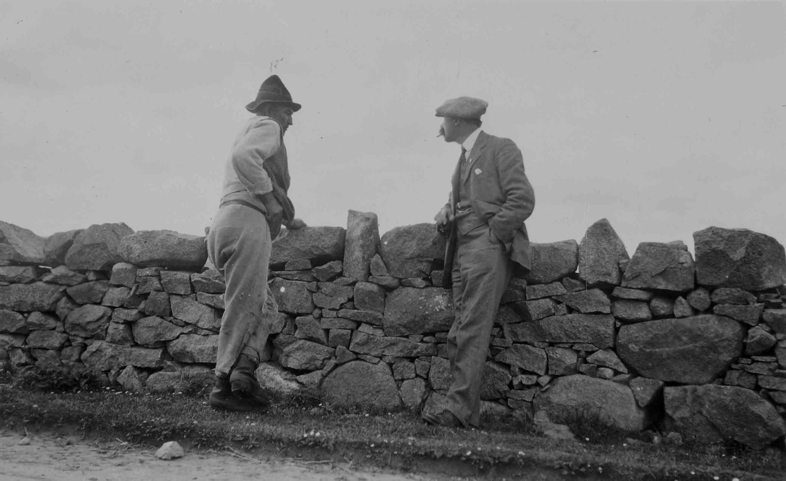 Dr. Douglas Hyde, pictured on the right here in 1913, has warned that unless schools in Connemara place Irish above English, the Irish language will be dead in the region within twenty years